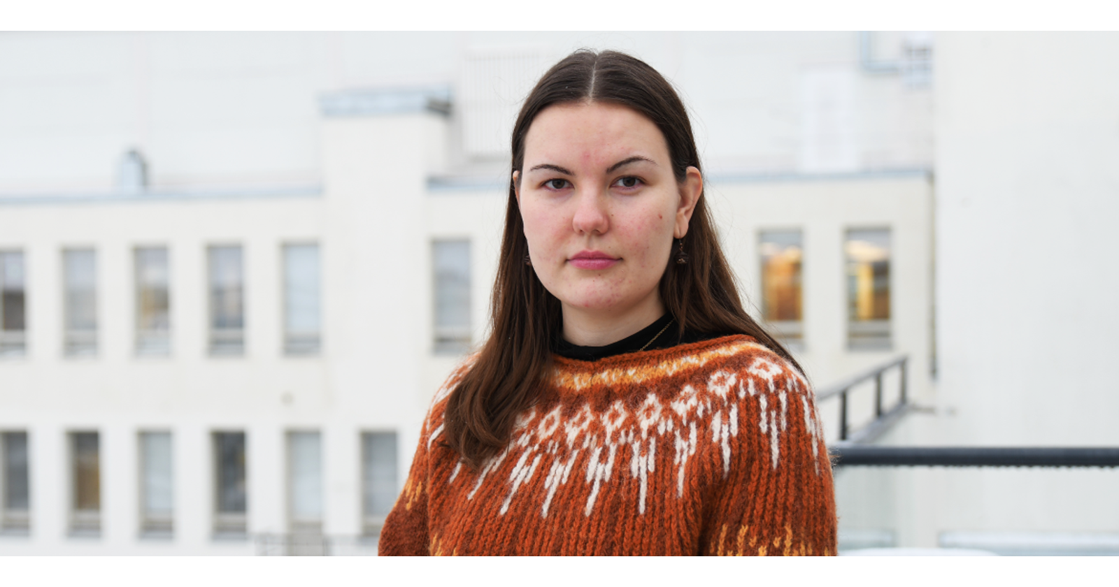 Close-up photo of Mimmi Eskelä looking at the camera.